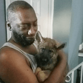 Mawo customer hugging German Shepherd puppy